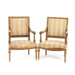 A pair of French gilt armchairs, Louis XVI style - 19th century