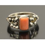 Ring with coral, author
