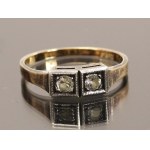 Ring with two zircons. Gold (134)