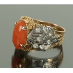 Ring with coral and zircons. Gold pr. 750 (190)