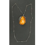 Magnificent pendant with amber, author