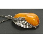 Magnificent pendant with amber, author