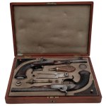 A pair of percussion pistols in a cartridge