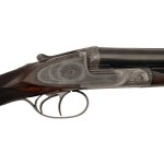 Engraved and gold inlaid double barrel shotgun with side locks, Defourny system, by Jindřich Holeček