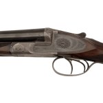 Engraved and gold inlaid double barrel shotgun with side locks, Defourny system, by Jindřich Holeček