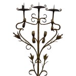Pair of baroque three-arm wrought iron candlesticks