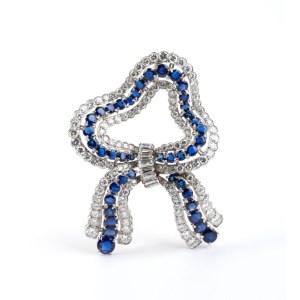 Platinum diamond sapphire ribbon brooch -