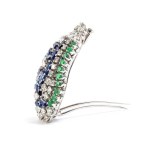 Gold brooch with diamonds, emeralds, and sapphires -