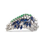 Gold brooch with diamonds, emeralds, and sapphires -
