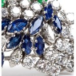Gold brooch with diamonds, emeralds, and sapphires -
