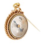 Tie pin in the form of a compass, early 20th century.