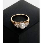 Gold ring with diamonds and pearl