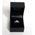 Gold ring with diamonds and pearl