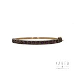 Stiff bracelet with rubies, early 20th century