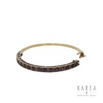 Stiff bracelet with rubies, early 20th century