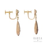 Tightening clips with ruby and rosettes, 1st half of the 20th century