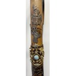 Wooden stick with badges of mountain refuges