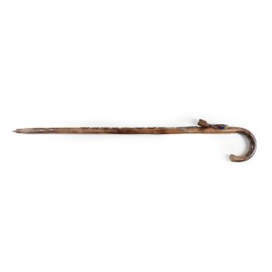 Wooden walking stick with badges of Polish and foreign mountain huts
