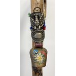 Wooden walking stick with badges of Polish and foreign mountain huts