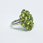 Sterling silver stately ring with natural Peridots and white Topazes