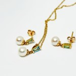 Gold set with Akoya pearls and Sky Blue Topazes