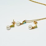 Gold set with Akoya pearls and Sky Blue Topazes