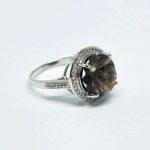 Silver ring with natural Smoky Quartz and white Topazes