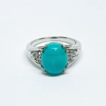 Silver ring with Turquoise and White Topazes