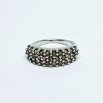 Silver ring with natural Andalusites