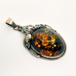 Silver large floral pendant with Amber