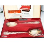 Two silver-plated Oneida spoons full set