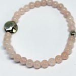 Silver stretchable bracelet with pink Quartz