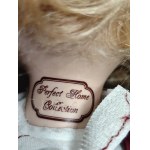 Three dolls in boxes