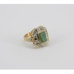 Ring with emerald