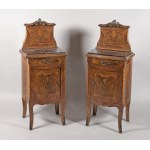 A pair of eclectic bedside cabinets