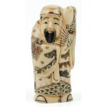 MAN WITH FISH, Japan, 20th century.