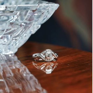 Ring with oval diamond and diamonds