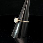 Yellow gold solitaire ring