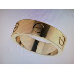 Wide 18K gold wedding ring with Cartier design