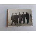 PHOTO KRAKOW FLORIAŃSKA FIVE MEN IN COATS
