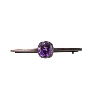 Silver brooch with an amethyst