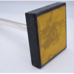 Silver crucifix on a marble base