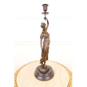 Świecznik z brązu z damą