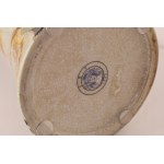 Porcelain carafe with bronze