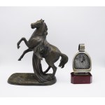 Horse figure and horseshoe-shaped clock