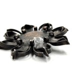 Metalwork - brooch in the form of a flower - communist period