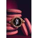 Brooch with depiction of an angel playing a lute, France, late 19th century.