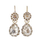 Day and night type earrings, early 20th century.