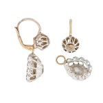 Day and night type earrings, early 20th century.