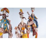 GIOVANNI DE SIMONE (Palermo, 1930 - Palermo, 1991) Lot of three stylised military figures in polychrome ceramic: